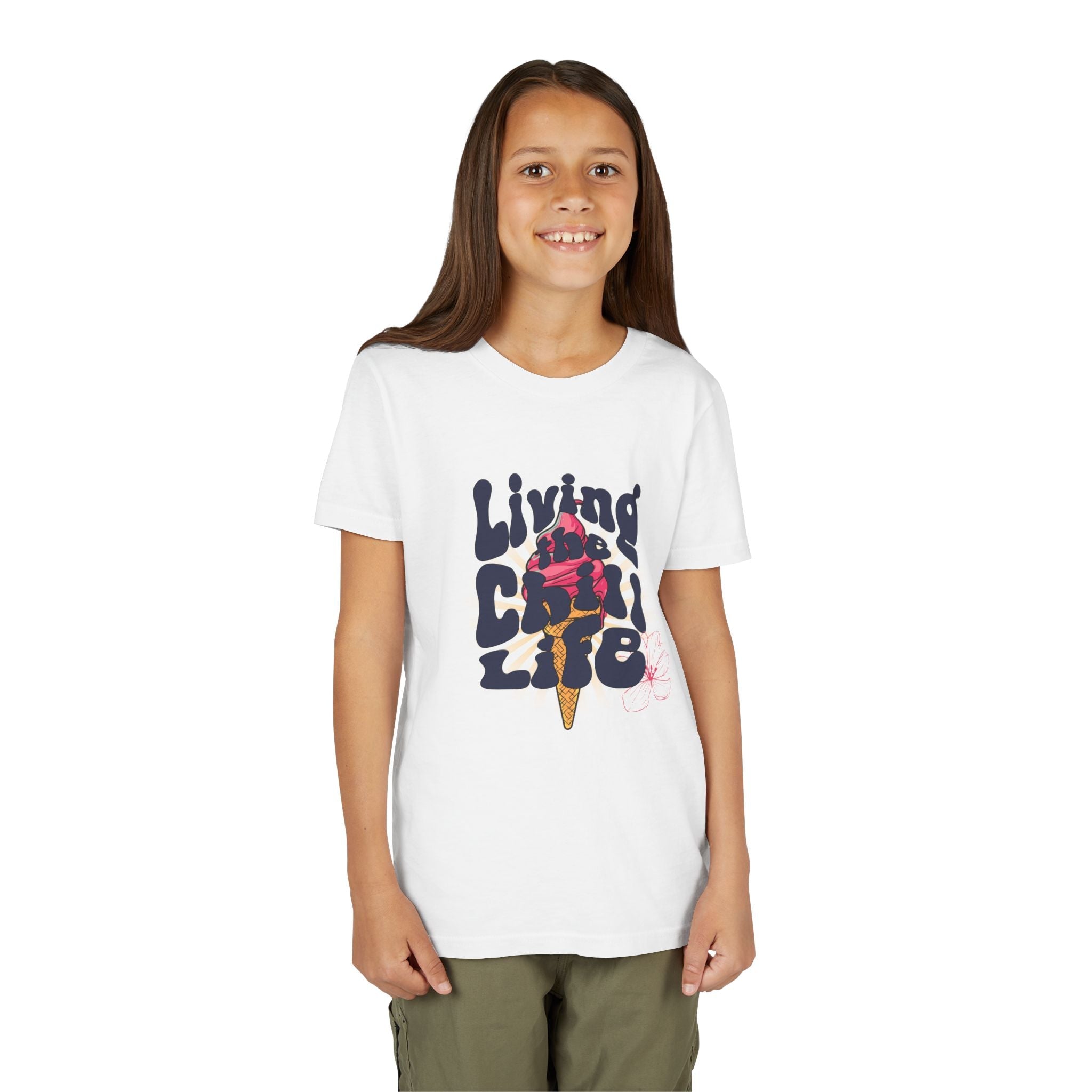 A young girl wearing a Capy Life white cotton youth t-shirt featuring a retro ice cream graphic and text.