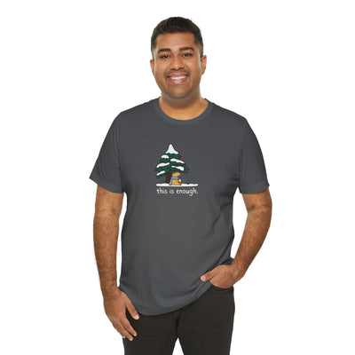 Capy Life charcoal grey t-shirt featuring a cute capybara illustration under a snowy tree with the text this is enough
