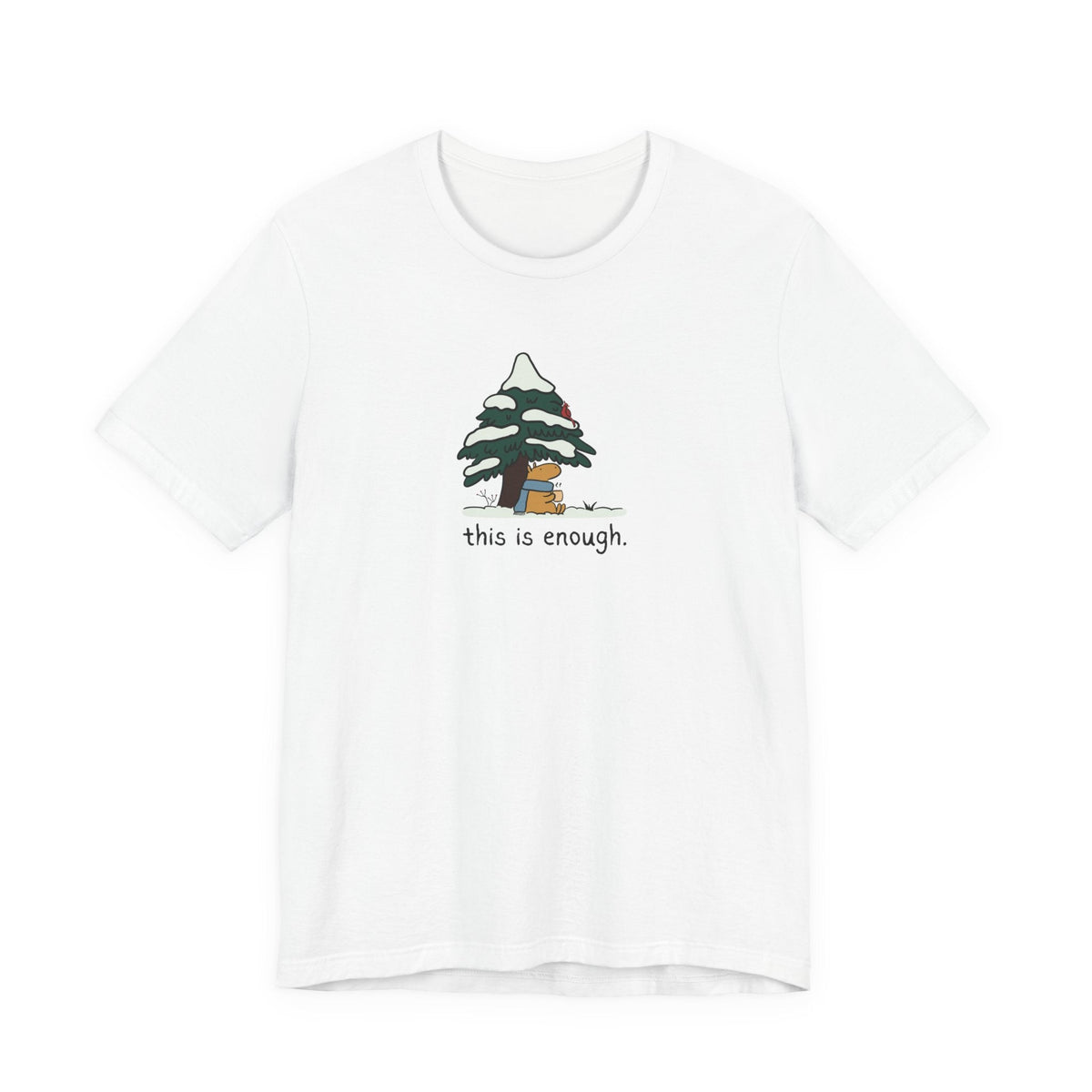 Capy Life white graphic t-shirt featuring a capybara in a blue scarf under a snowy evergreen tree with text.