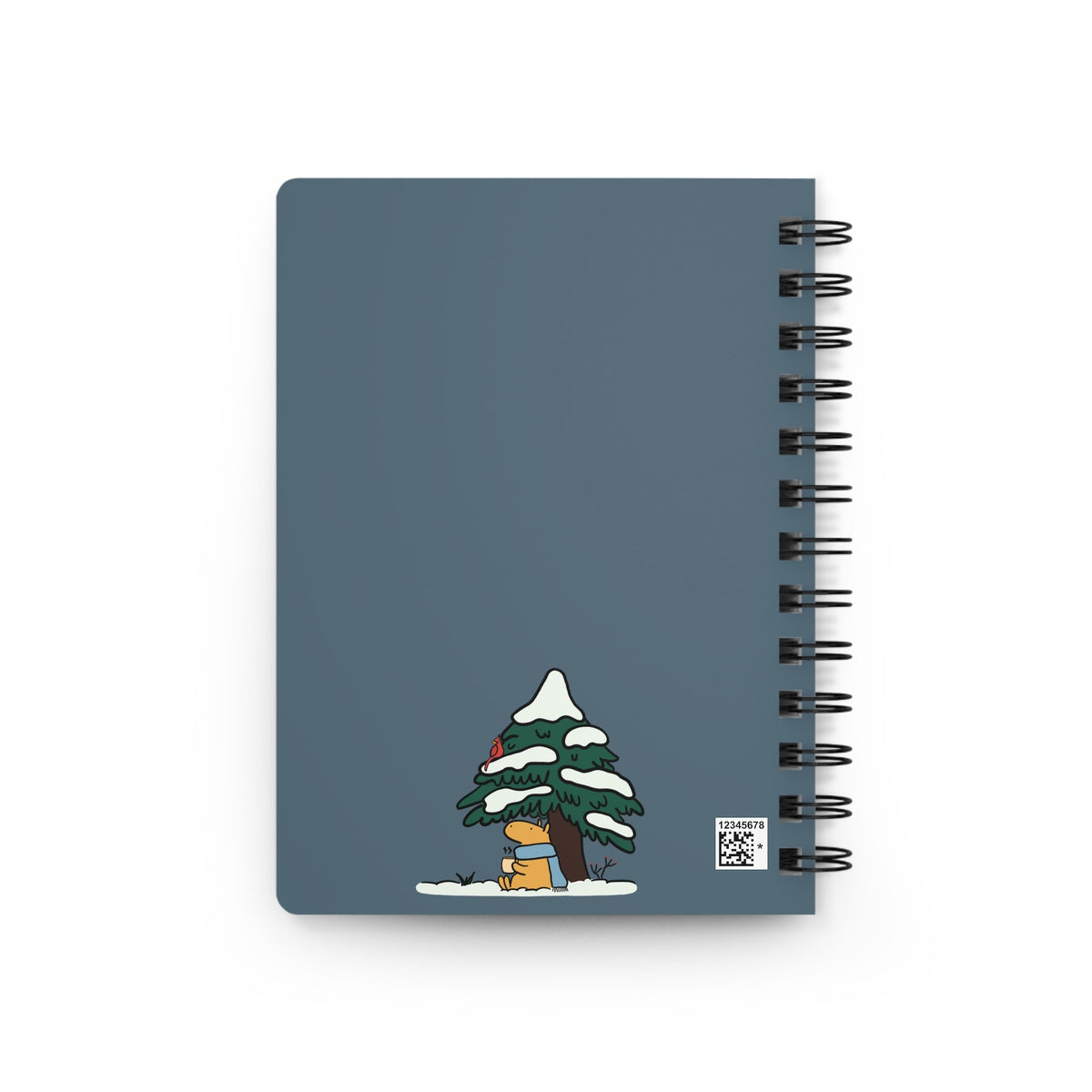 Capy Life spiral notebook with a muted blue cover featuring a capybara in a scarf under a snowy evergreen tree.