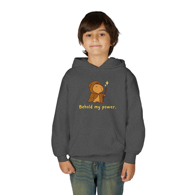 Capy Life kids dark grey pullover hoodie featuring a cute wizard capybara graphic with the text Behold my power.