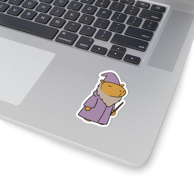 Capy Life wizard capybara sticker featuring a capybara in a purple robe, pointed hat, and beard holding a wand