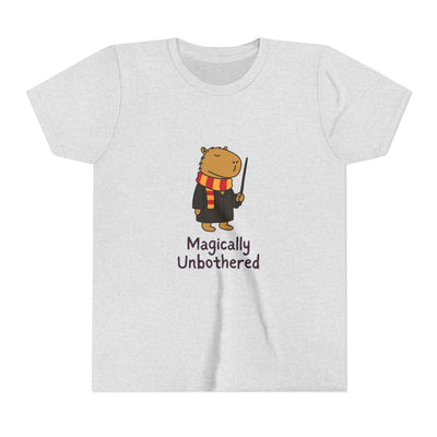 Capy Life youth t-shirt in heather grey featuring a cute wizard capybara with a wand and the text Magically Unbothered