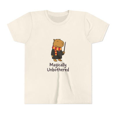 Capy Life youth tee featuring a wizard capybara in a robe and scarf holding a wand with Magically Unbothered text.